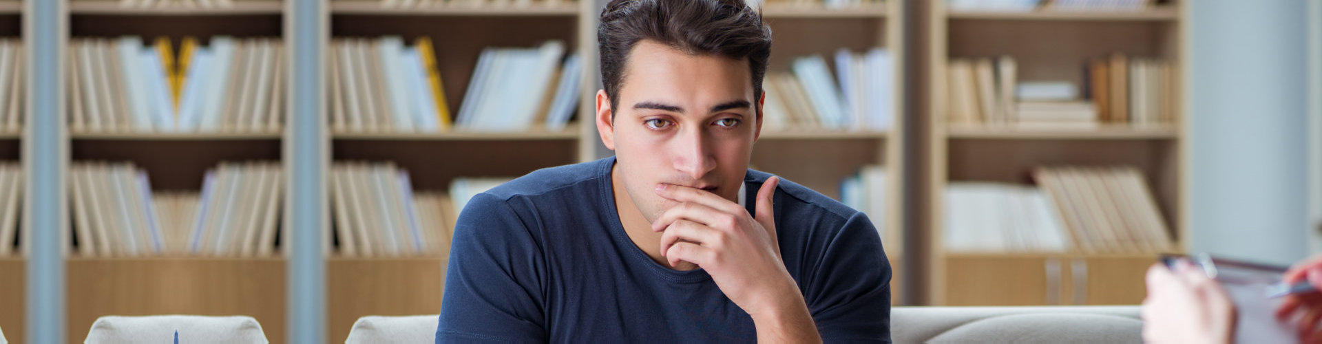 stressed man in the clinic with his doctor