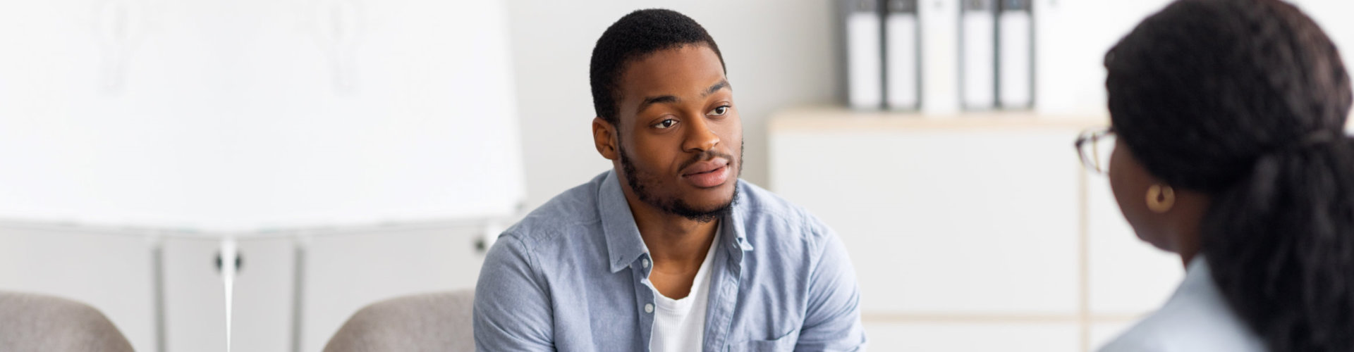 man talking to her doctor in the clinic