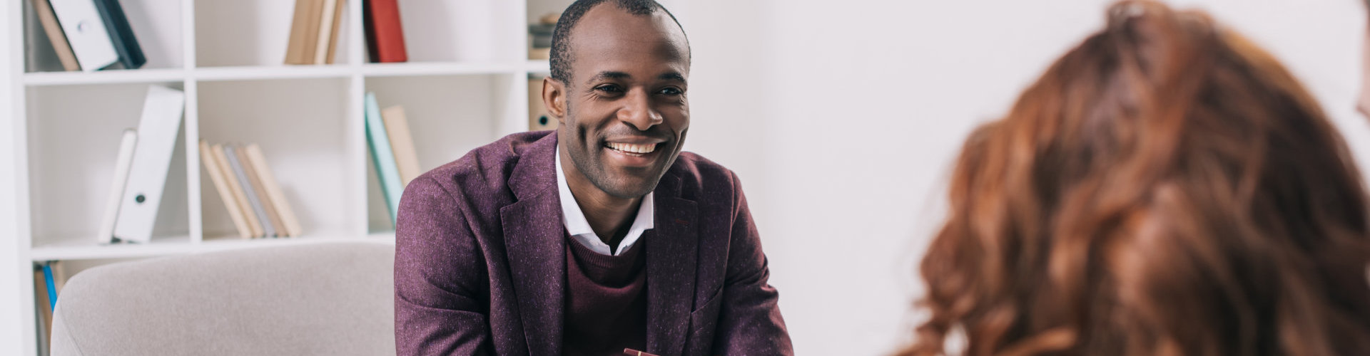 happy man talking to a female doctor